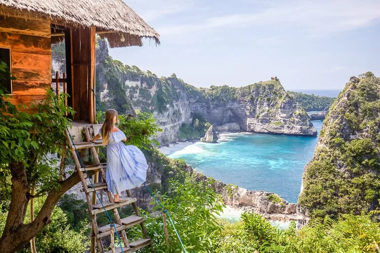 Woman looking at Nusa Penida coast