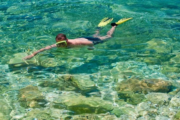 Man snorkeling in adriatic sea Croatia